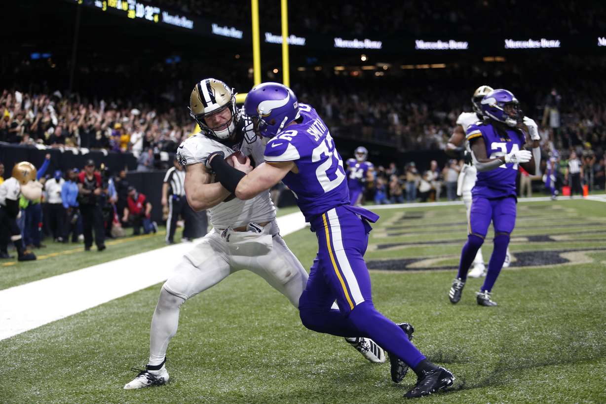 New Orleans Saints Taysom Hill pulls in touchdown reception against Minnesota Vikings free safety Harrison Smith (22) in the second half of an NFL wild-card playoff football game, Sunday, Jan. 5, 2020, in New Orleans. (Photo: Brett Duke, AP)