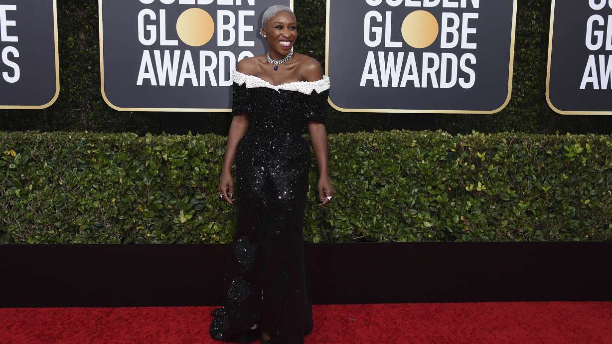 Plenty of pink, puffy sleeves and shimmer at Golden Globes