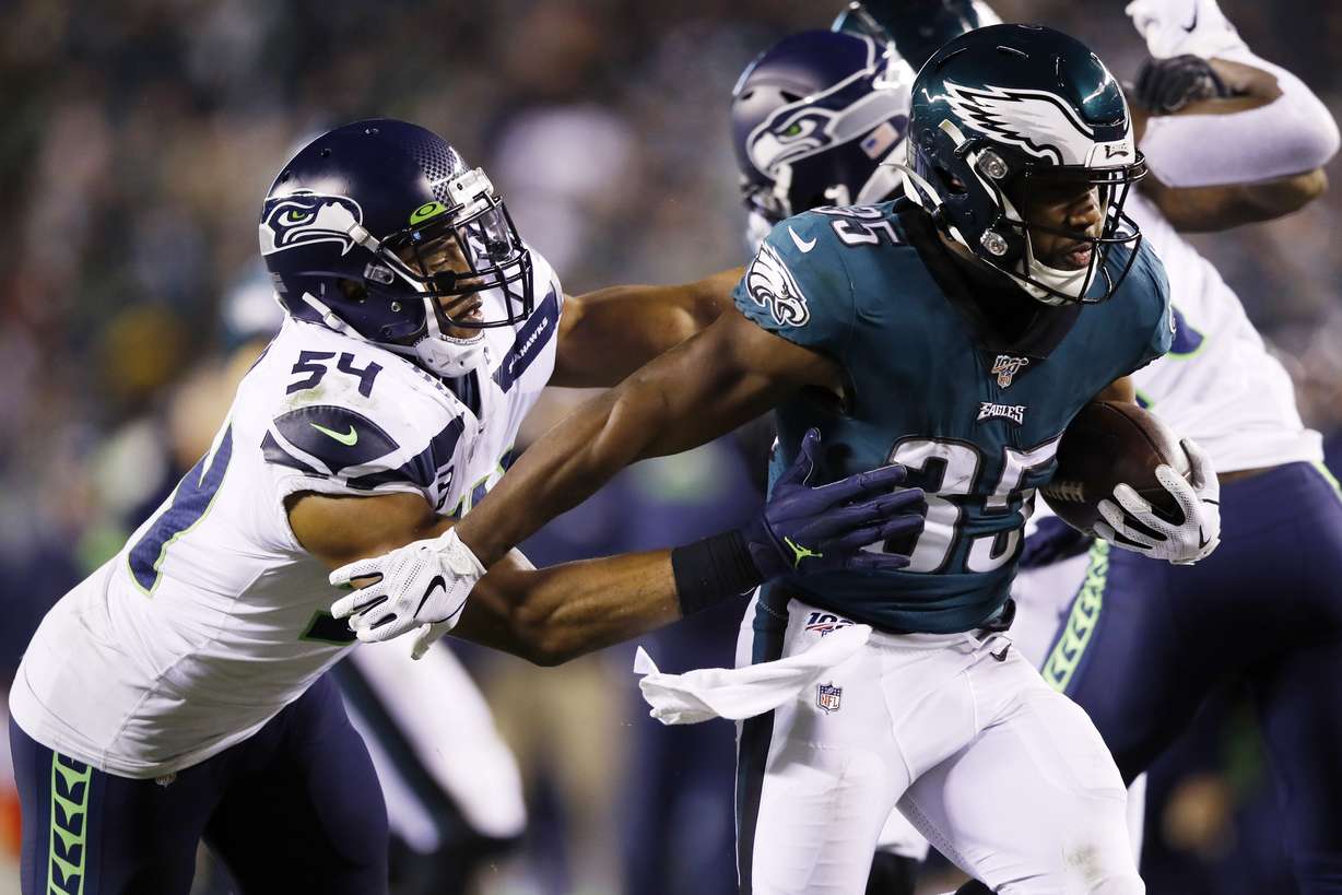 Philadelphia Eagles' Boston Scott (35) tries to rush past Seattle Seahawks' Bobby Wagner (54) during the second half of an NFL wild-card playoff football game, Sunday, Jan. 5, 2020, in Philadelphia. (Photo: Matt Rourke, AP)