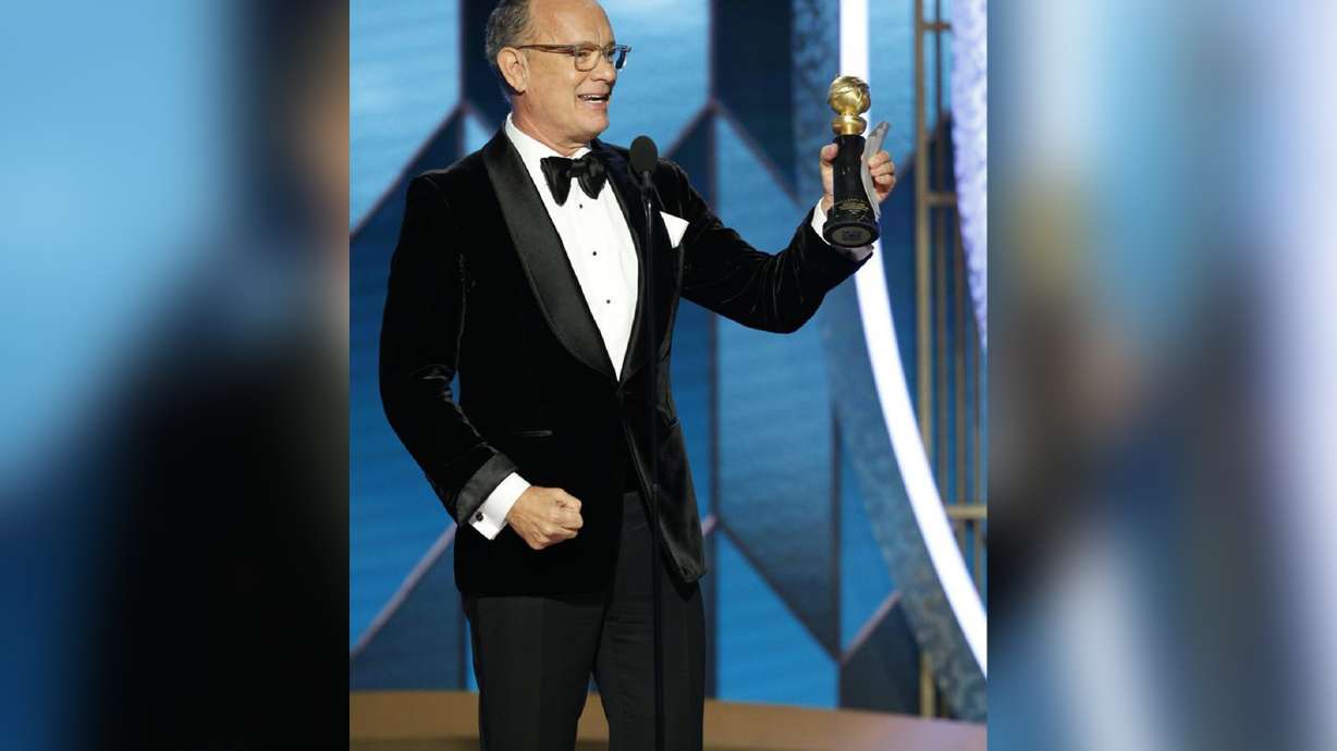 Tom Hanks fought a cold and tears in touching Globes speech