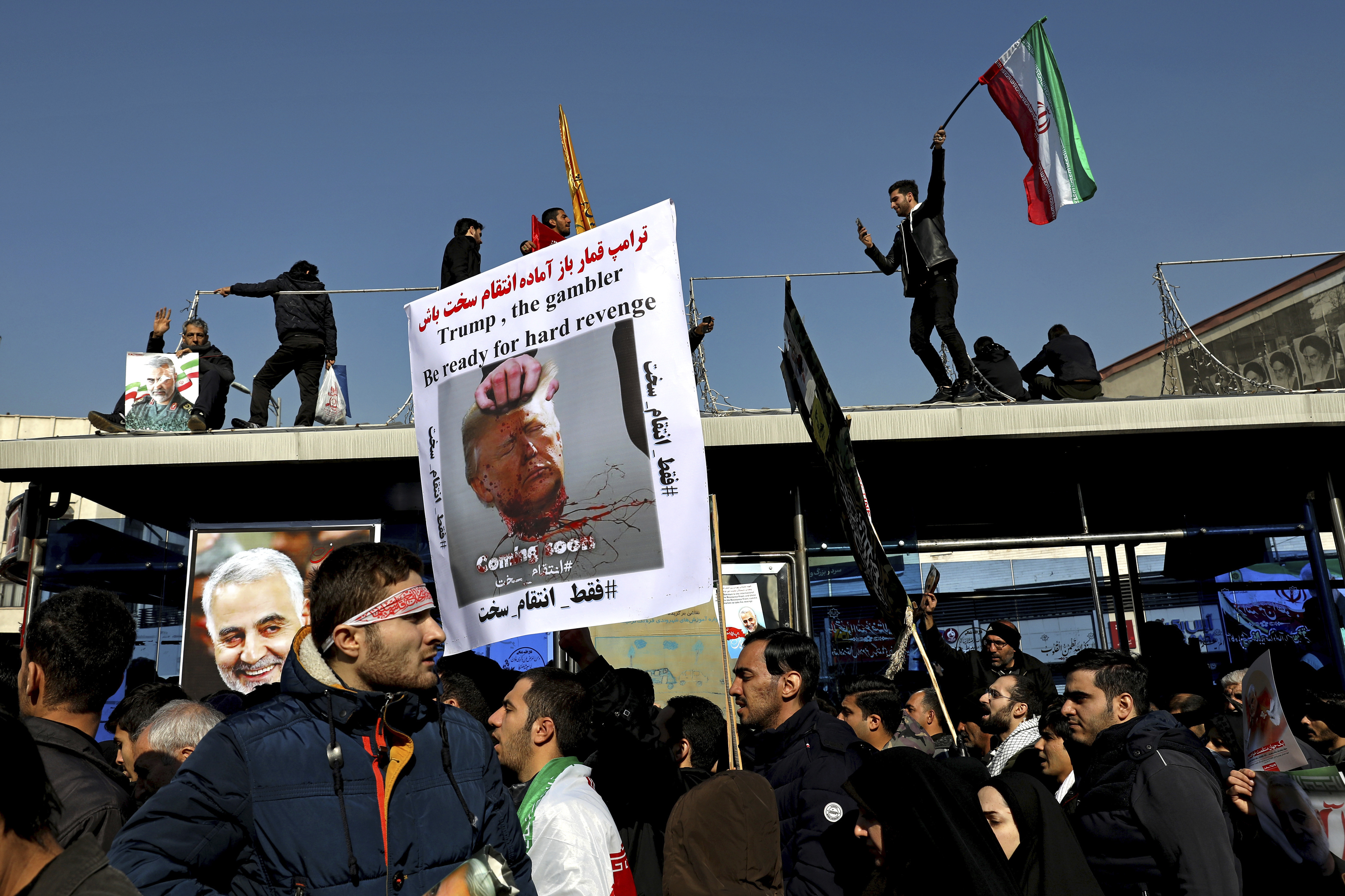 Mourners attend a funeral ceremony for Iranian Gen. Qassem Soleimani and his comrades, who were killed in Iraq in a U.S. drone strike on Friday, at the Enqelab-e-Eslami (Islamic Revolution) square in Tehran, Iran, Monday, Jan. 6, 2020. Photo: Lefteris Pitarakis, AP Photo