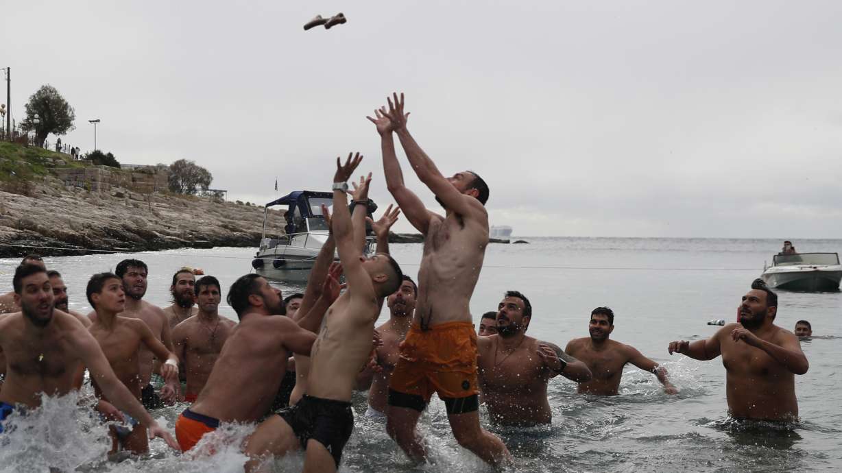 Seeking the cross: Icy dips mark the feast of Epiphany