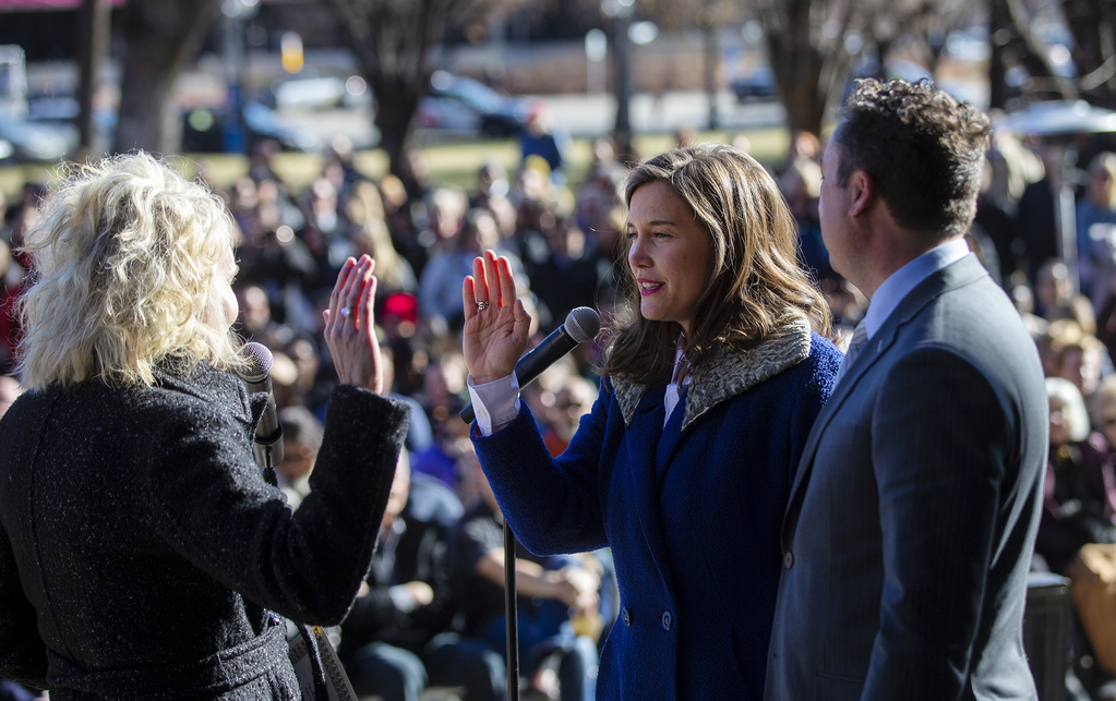 Salt Lake City Recorder, Cindi Mansell administers the oath of office to Erin Mendenhall as she is sworn in as Salt Lake City Mayor at a city council meeting on the east steps of the City and County Building in Salt Lake City on Monday, Jan. 6, 2020. Mayor Mdenhall’s husband Kyle LaMalfa also stood with her. (Photo: Scott G. Winterton, KSL)