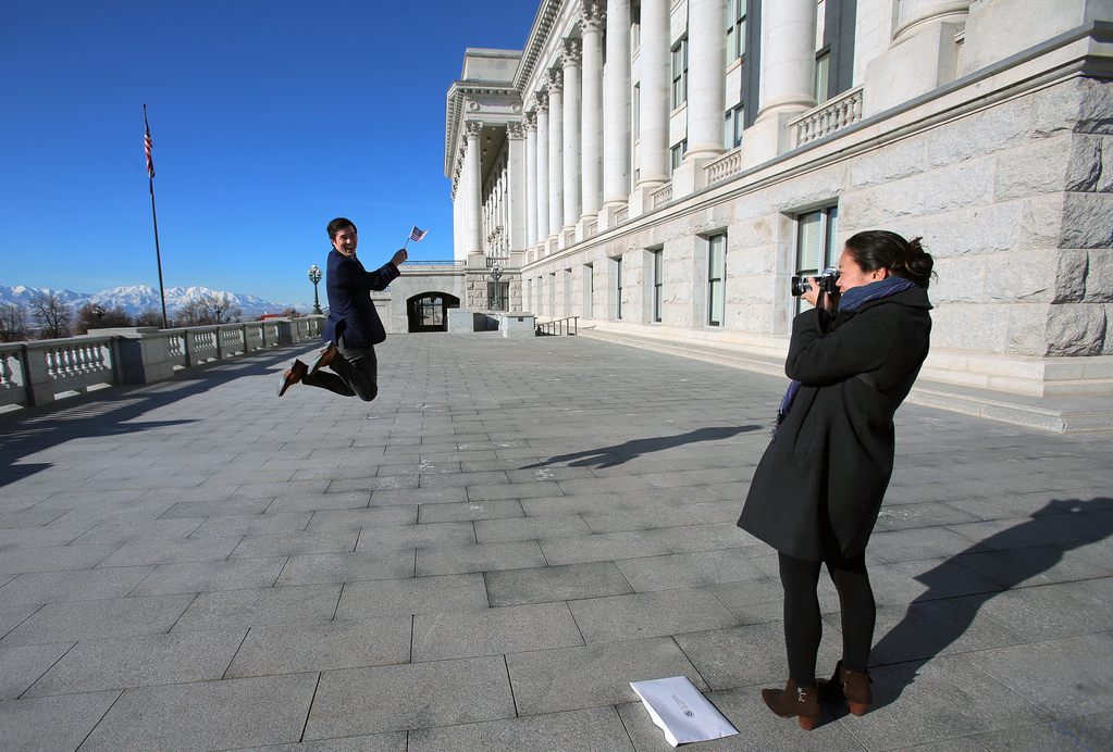 Alexandra Pham takes a photo of Galvin Clancey after he took the oath of allegiance at the Capitol in Salt Lake City on Monday, Jan. 6, 2020. (Photo: Scott G. Winterton, KSL)