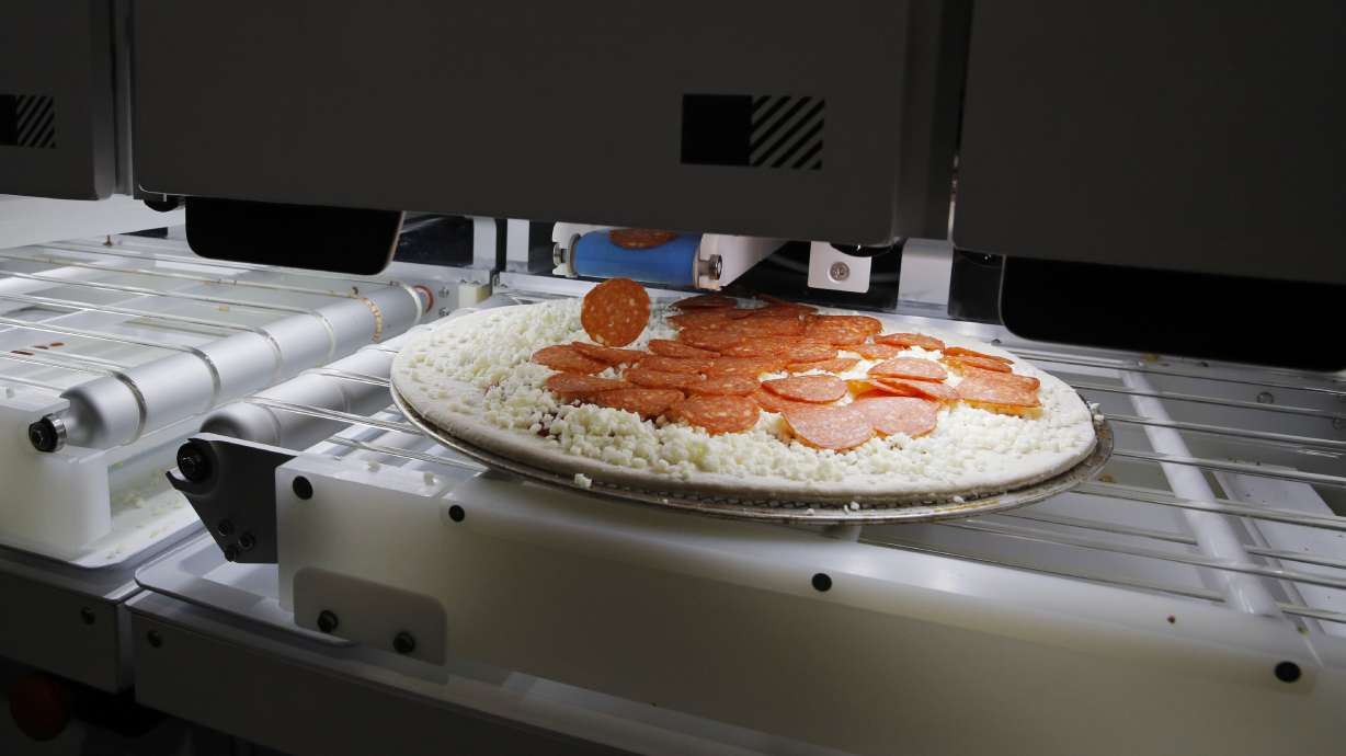 CES Gadget Show: Pizza from robots, underwater scooters