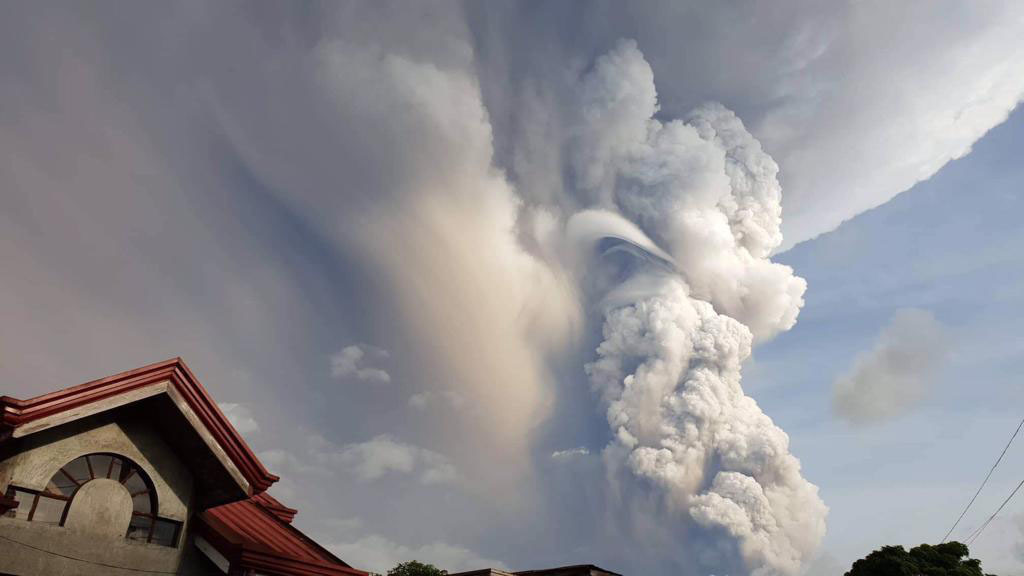 Tiny Philippine volcano ejects smoke and ash, villagers flee