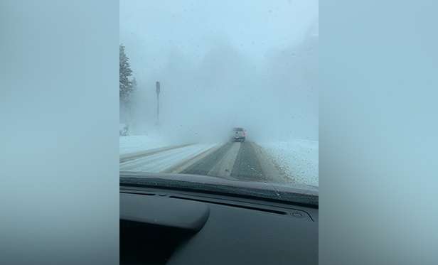 An avalanche in Little Cottonwood Canyon partially buried on vehicle and sent it off the road Sunday morning on Jan. 12, 2020. (Photo courtesy of Pete Pelletier)