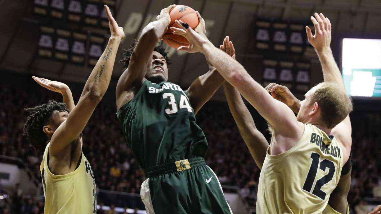 Purdue defense bottles up No. 8 Spartans in 71-42 upset
