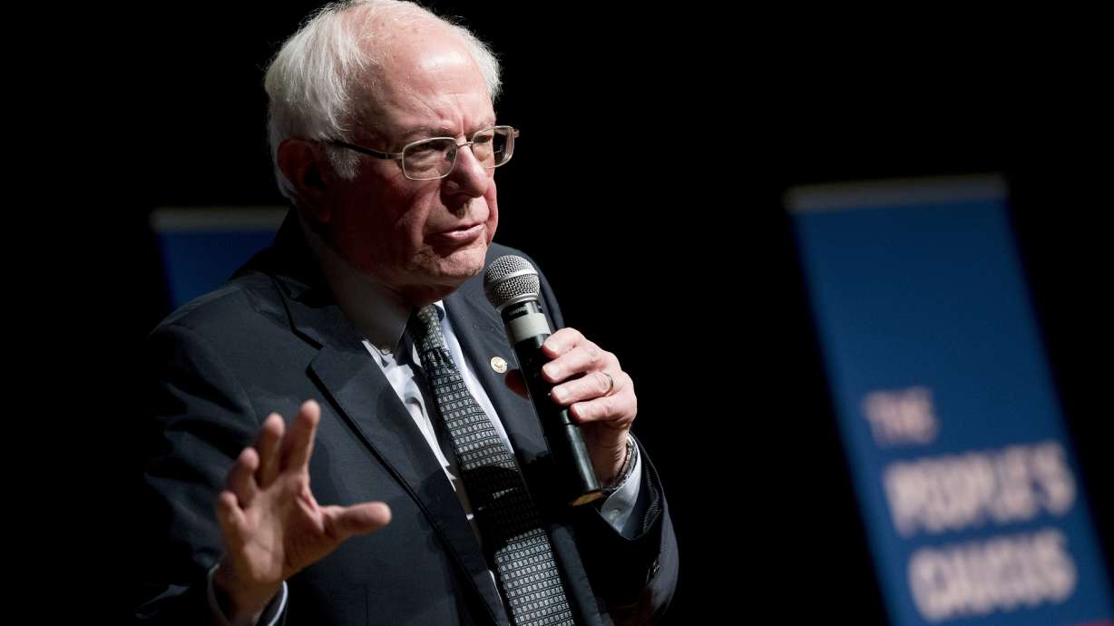 Rising in the polls, Sanders takes jabs from Trump, Warren