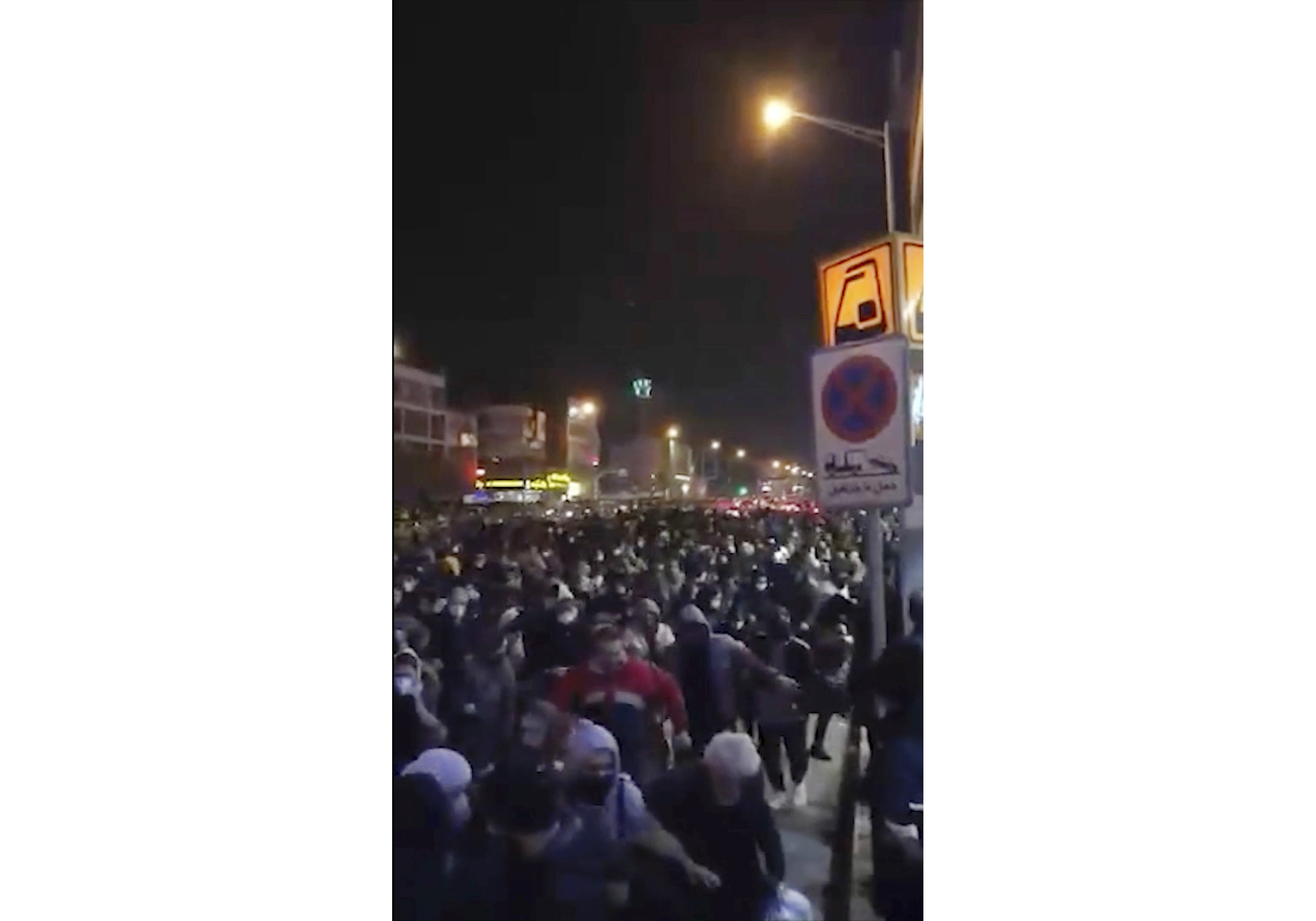 Anger in Iran over jet's downing; gunfire disperses protests
