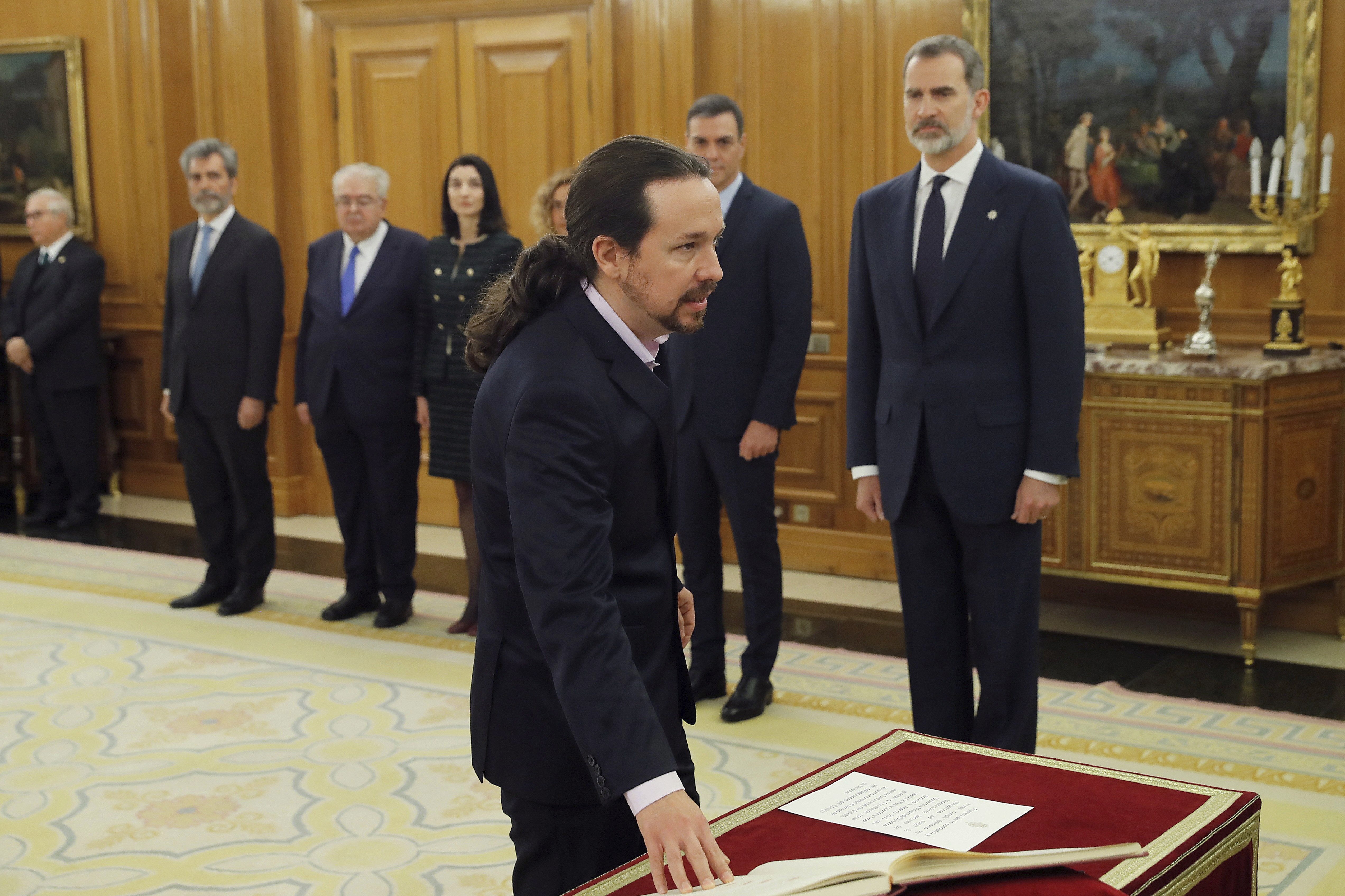 Despite differences, Spain gets its new coalition government