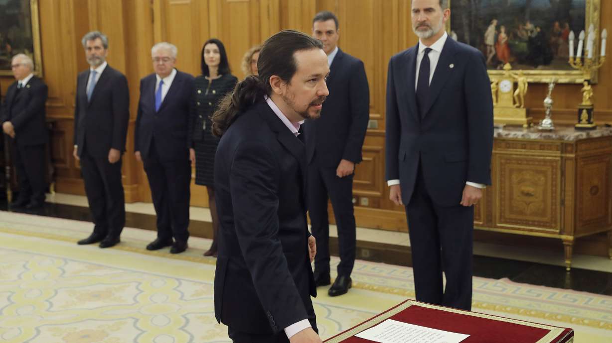 Despite differences, Spain gets its new coalition government
