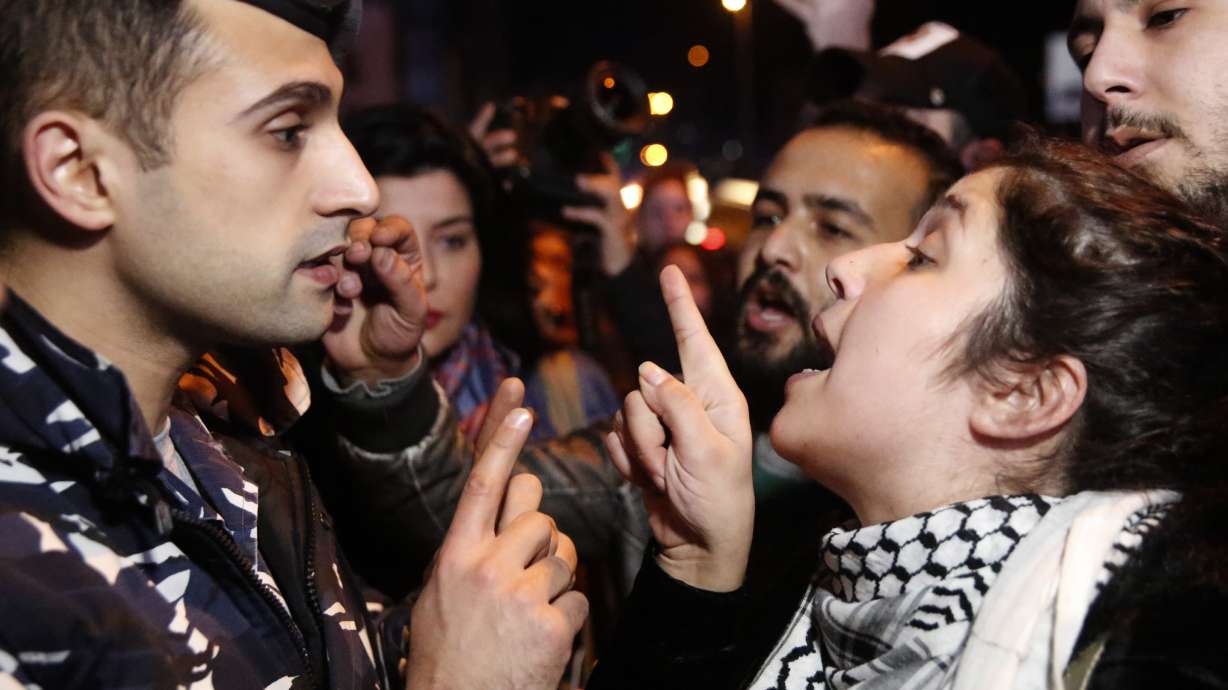 Lebanese protesters block road outside central bank