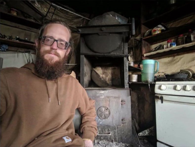 Tayson Steele is pictured in his cabin in the Susitna Valley in Alaska in this undated photo. Steele spent 23 days stranded in the Alaskan wilderness after his cabin caught fire. (Family photo)