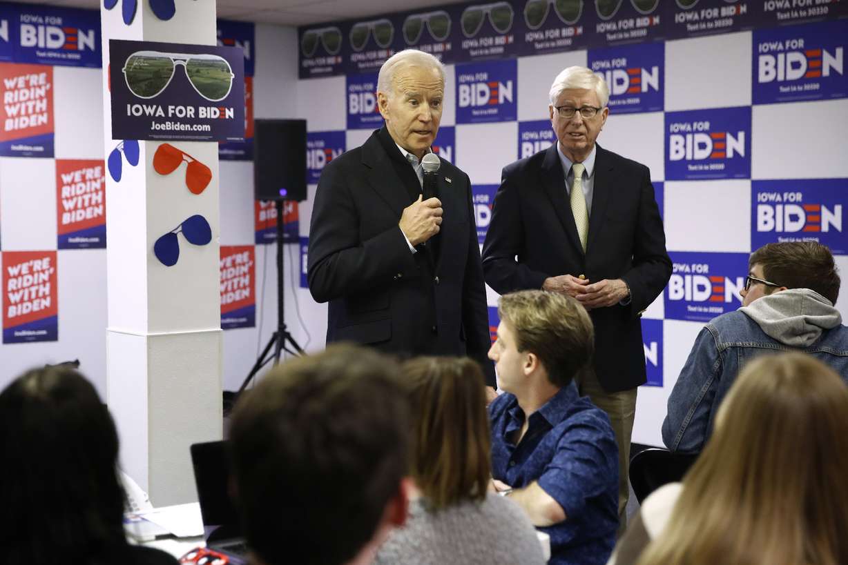 Democratic presidential candidate former Vice President Joe Biden speaks alongside Iowa attorney general Tom Miller during a stop at a campaign field office, Monday, Jan. 13, 2020, in Des Moines, Iowa. (AP Photo/Patrick Semansky)