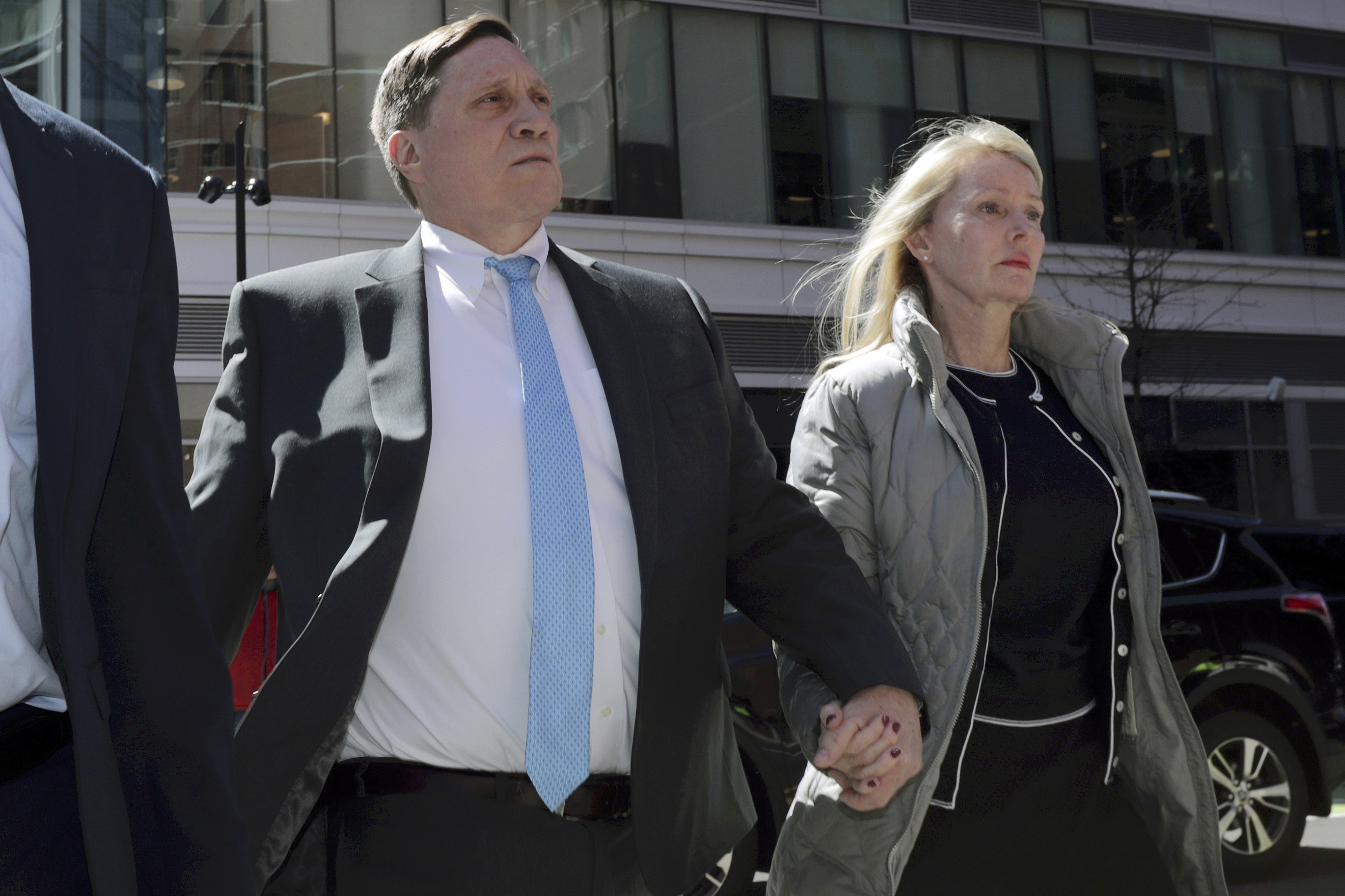 Parent faces new tax fraud charge in college bribery case