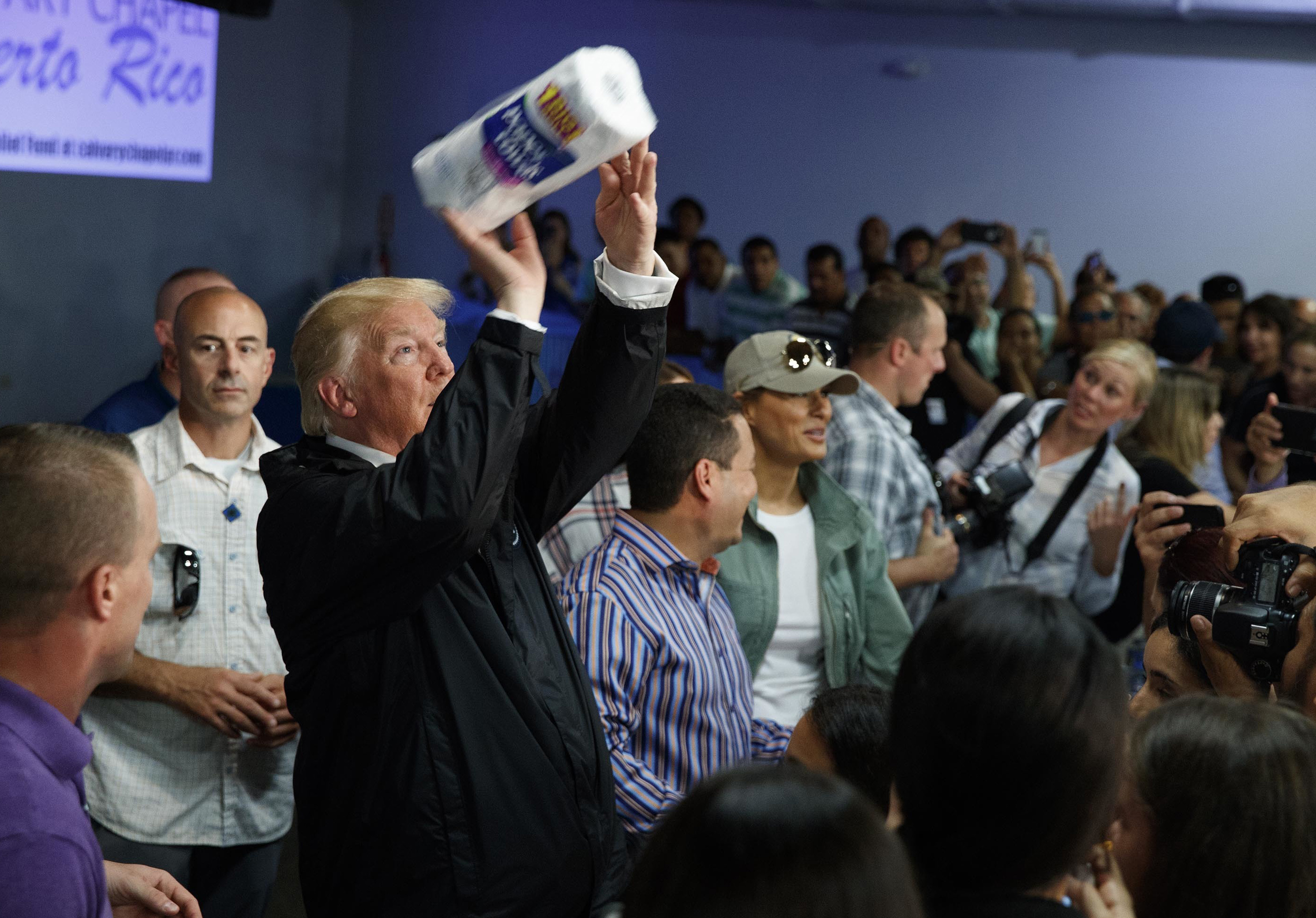 Democrats unveil billboard of Trump tossing paper towels