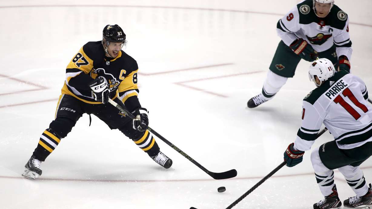 Crosby collects 4 points in return, Penguins rip Wild 7-3