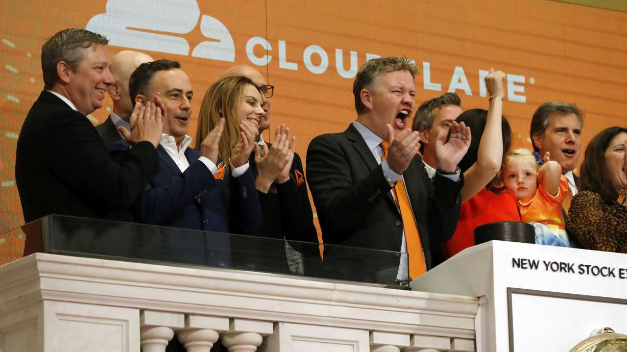 Cloudflare CEO Matthew Prince, right center, applauds during New York Stock Exchange ceremonies Sept. 13, 2019. Prince is suing his Park City neighbors because of "aggressive" dogs after those same neighbors challenged the approval of his proposed house.