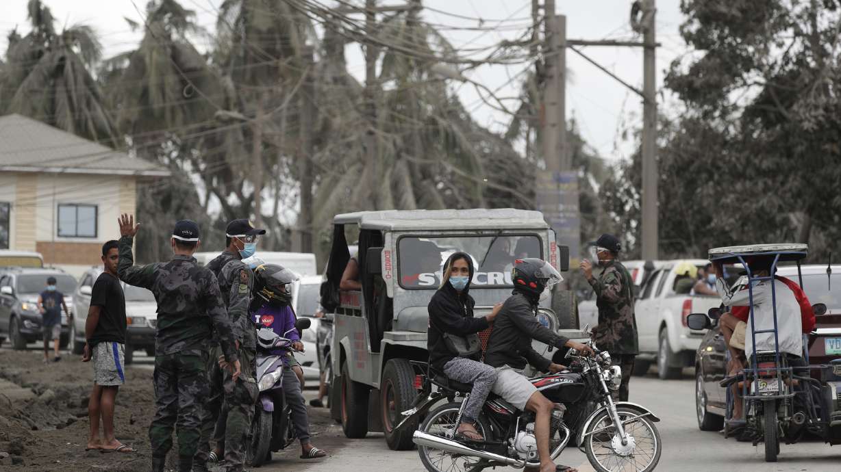 Officials block villagers as quakes shake Philippine volcano