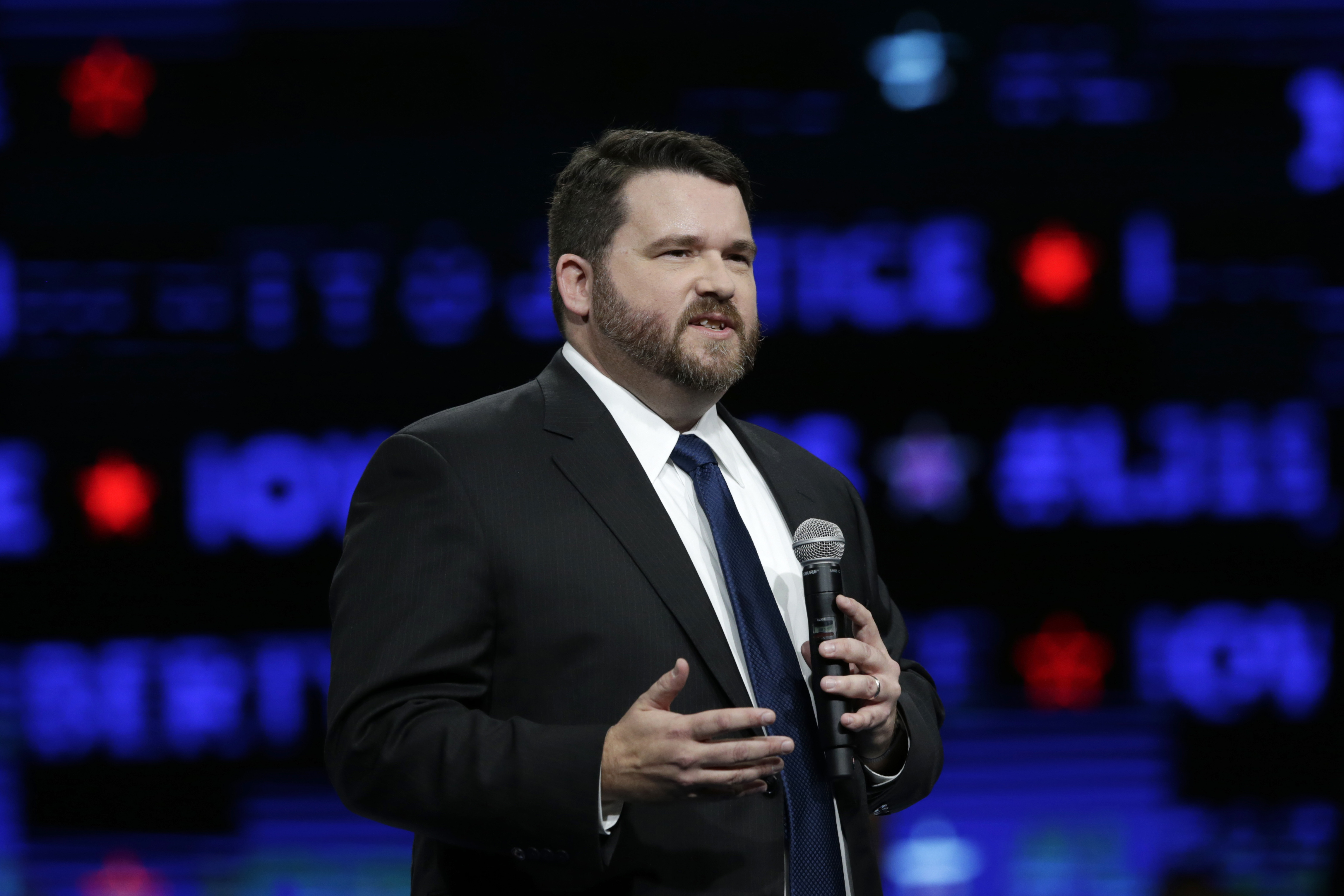 Amid hacking fears, key caucus states to use app for results