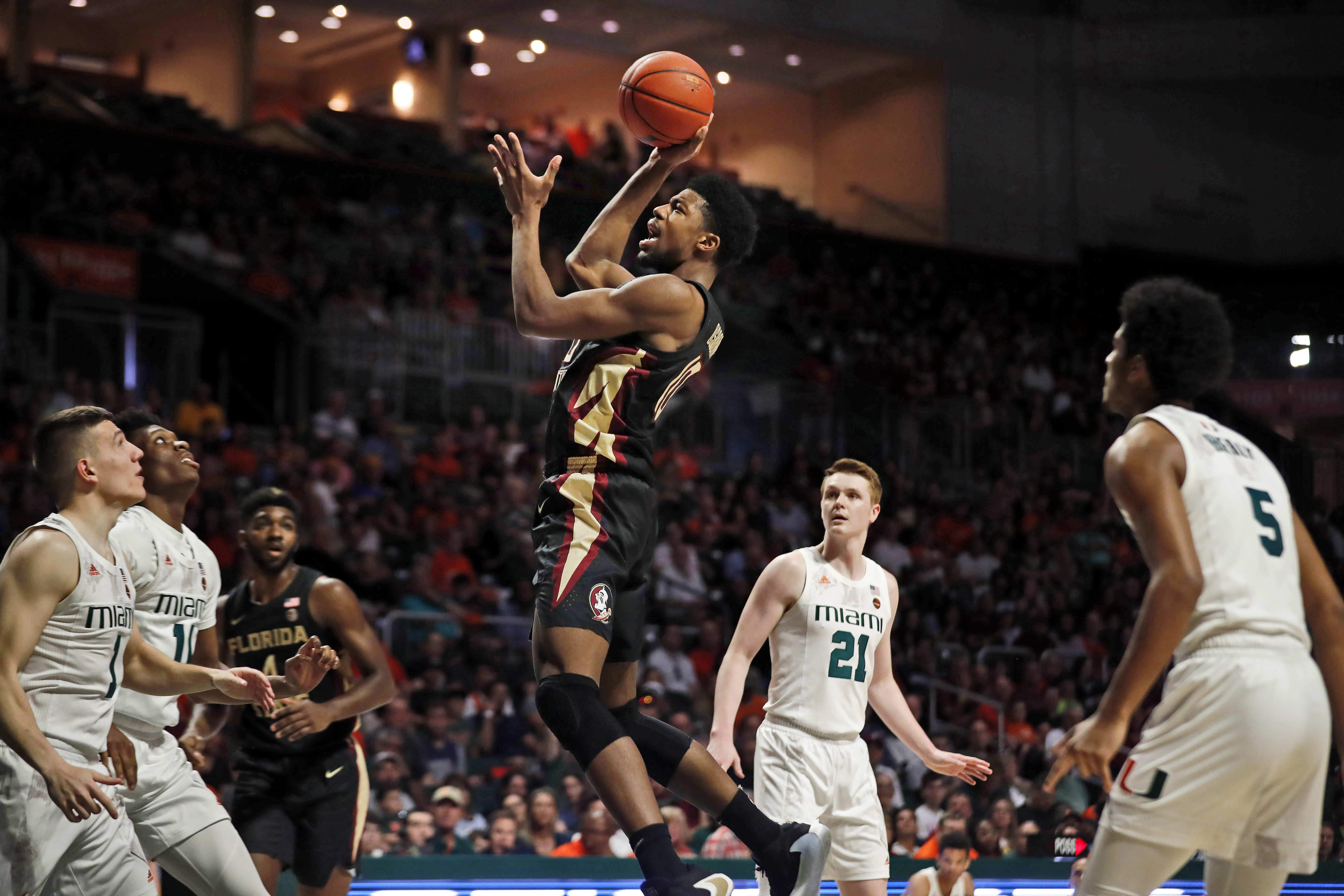 No. 9 Florida State rallies past Miami in OT, 83-79