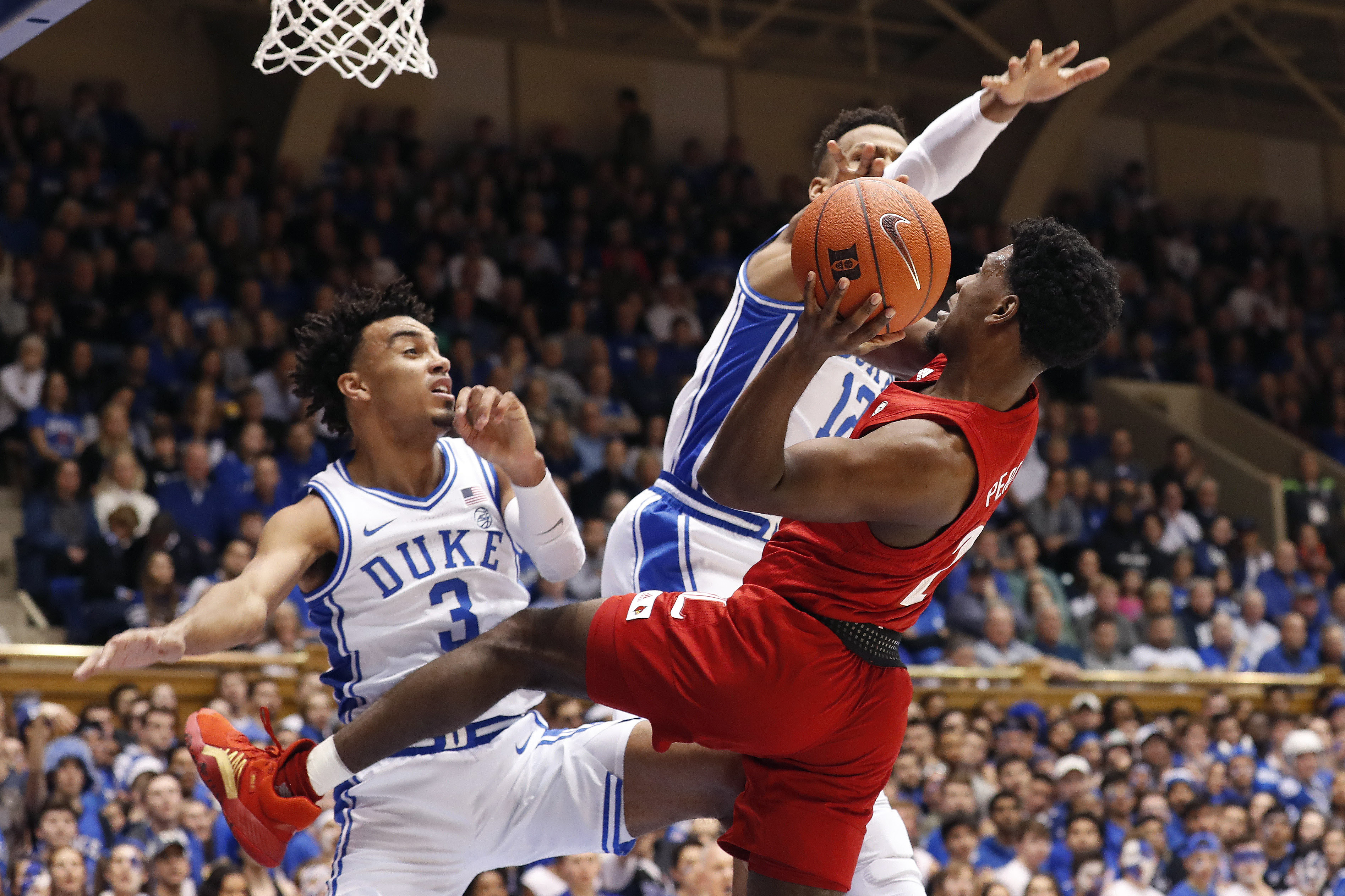 Johnson, No. 11 Louisville earn win at No. 3 Duke 79-73