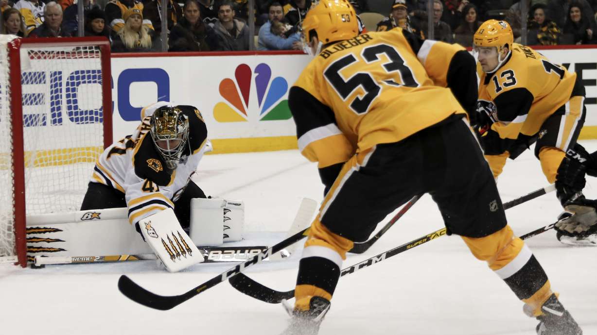 Rust, Johnson help Pittsburgh rally past Bruins 4-3