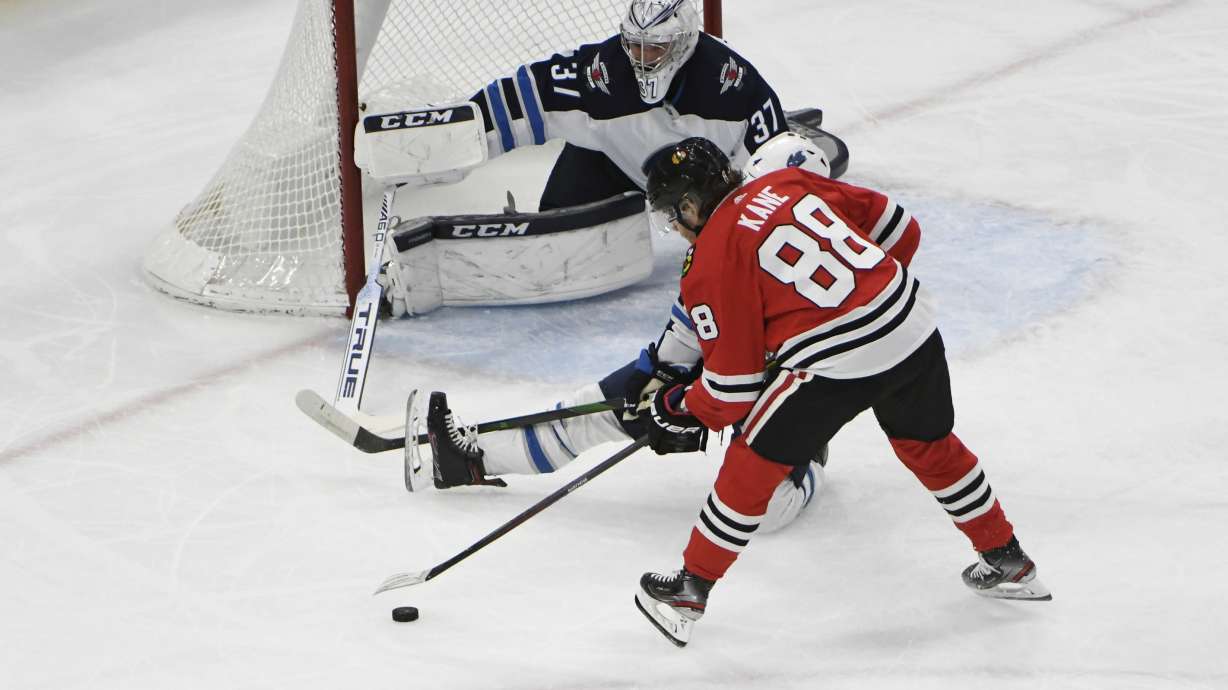 Kane gets 1,000th point, Blackhawks beat Jets 5-2