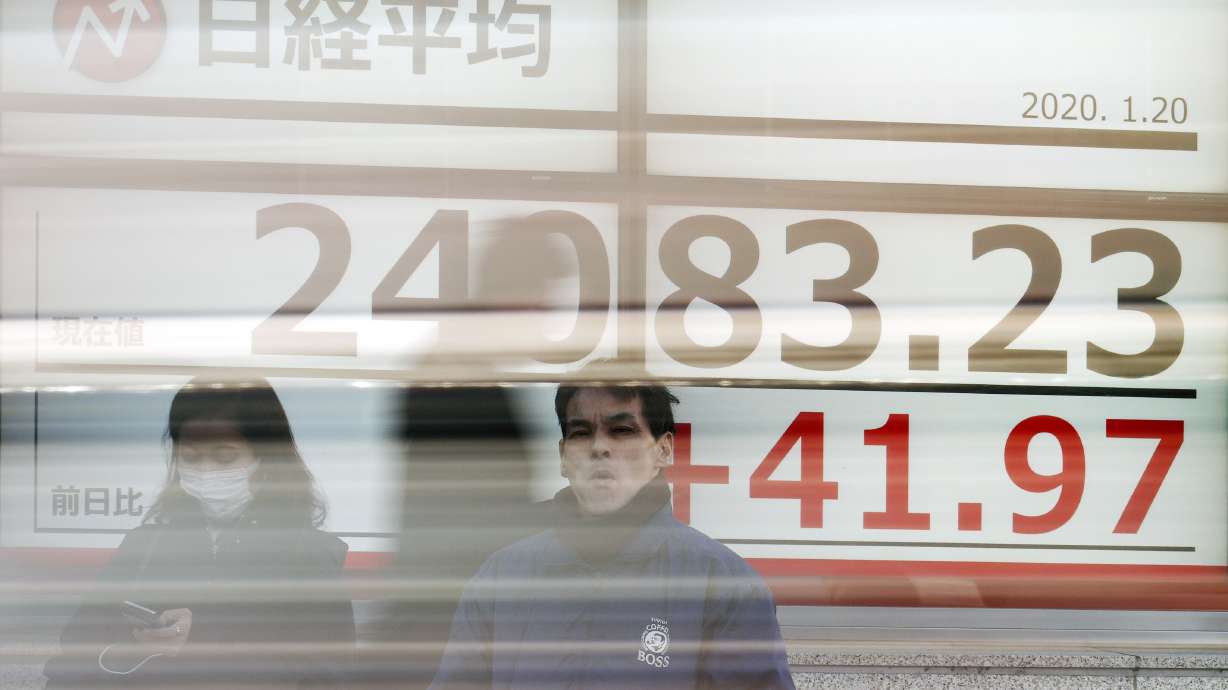 Global stocks slide on growing concern about China virus