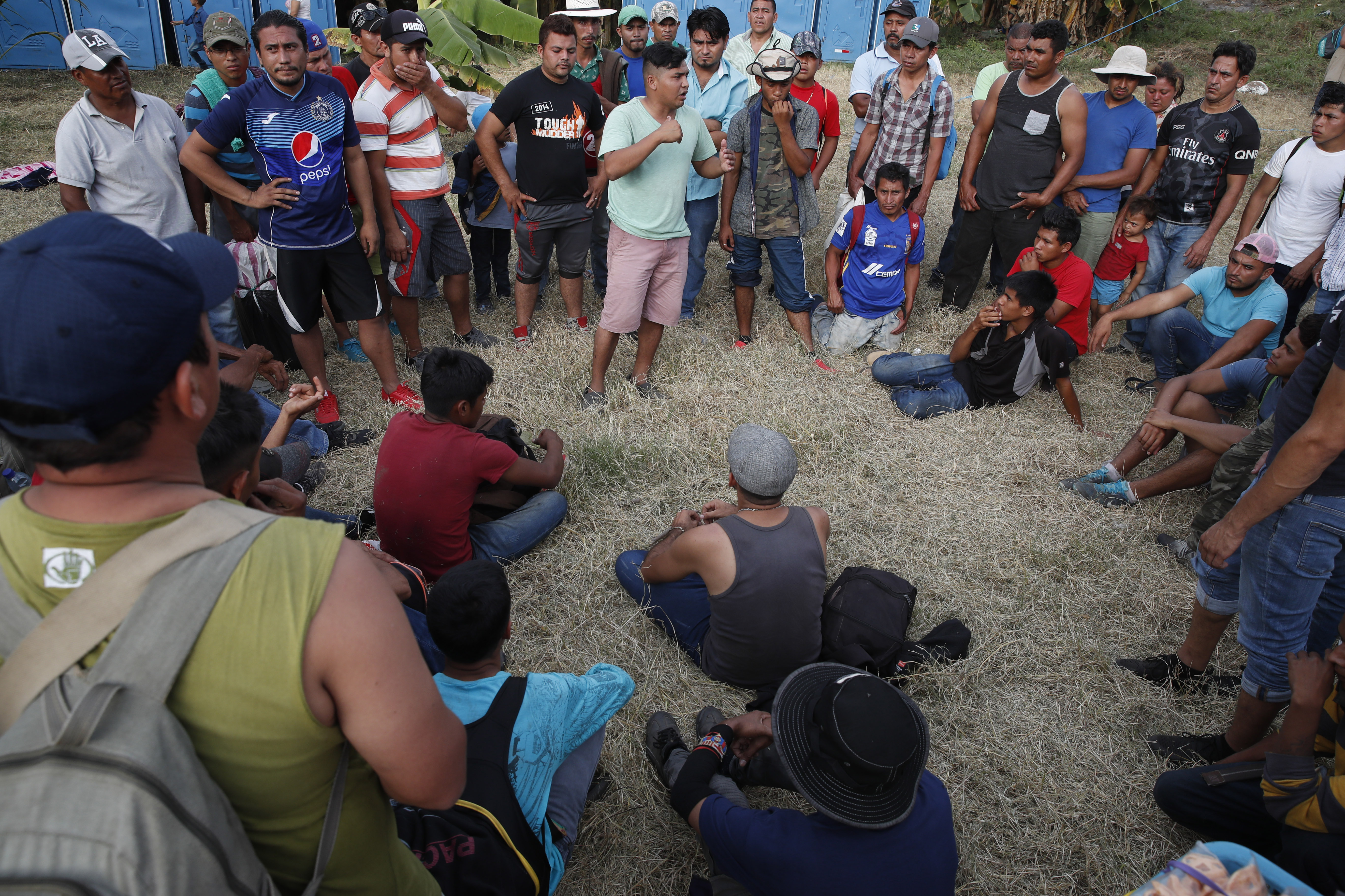Migrants scuffle with Mexican troops along border river