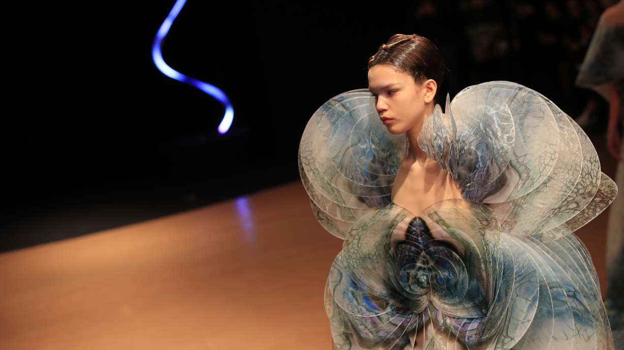 Paris couture climbs Mount Olympus, plumbs marine depths