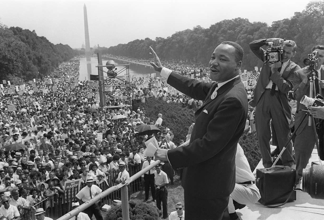 The Rev. Martin Luther KIng Jr. waves to supporters during the 1963 March on Washington. (Photo: AFP/Getty Images via CNN)