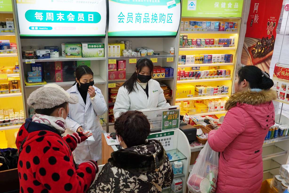 Staff sell masks at a Yifeng Pharmacy in Wuhan, Chin, Wednesday, Jan. 22, 2020. Pharmacies in Wuhan are restricting customers to buying one mask at a time amid high demand and worries over an outbreak of a new coronavirus. The number of cases of the new virus has risen over 400 in China and the death toll to 9, Chinese health authorities said Wednesday. (Photo: Dake Kang, AP Photo)