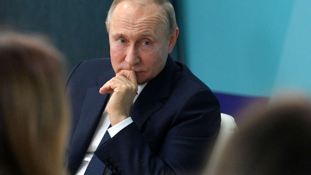 Russia's Putin remains secretive about his future role