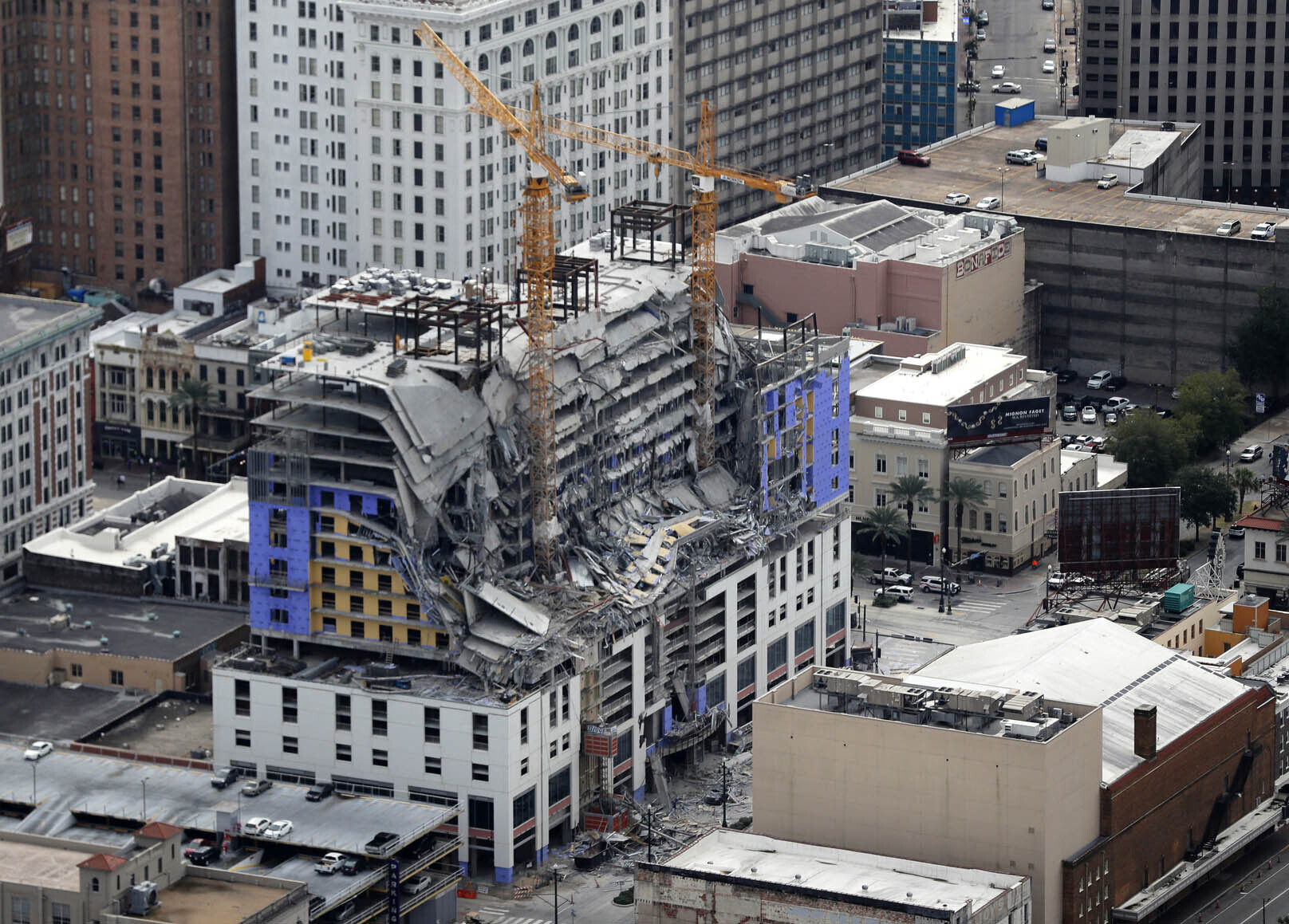 New tarp covers exposed remains at New Orleans collapse site