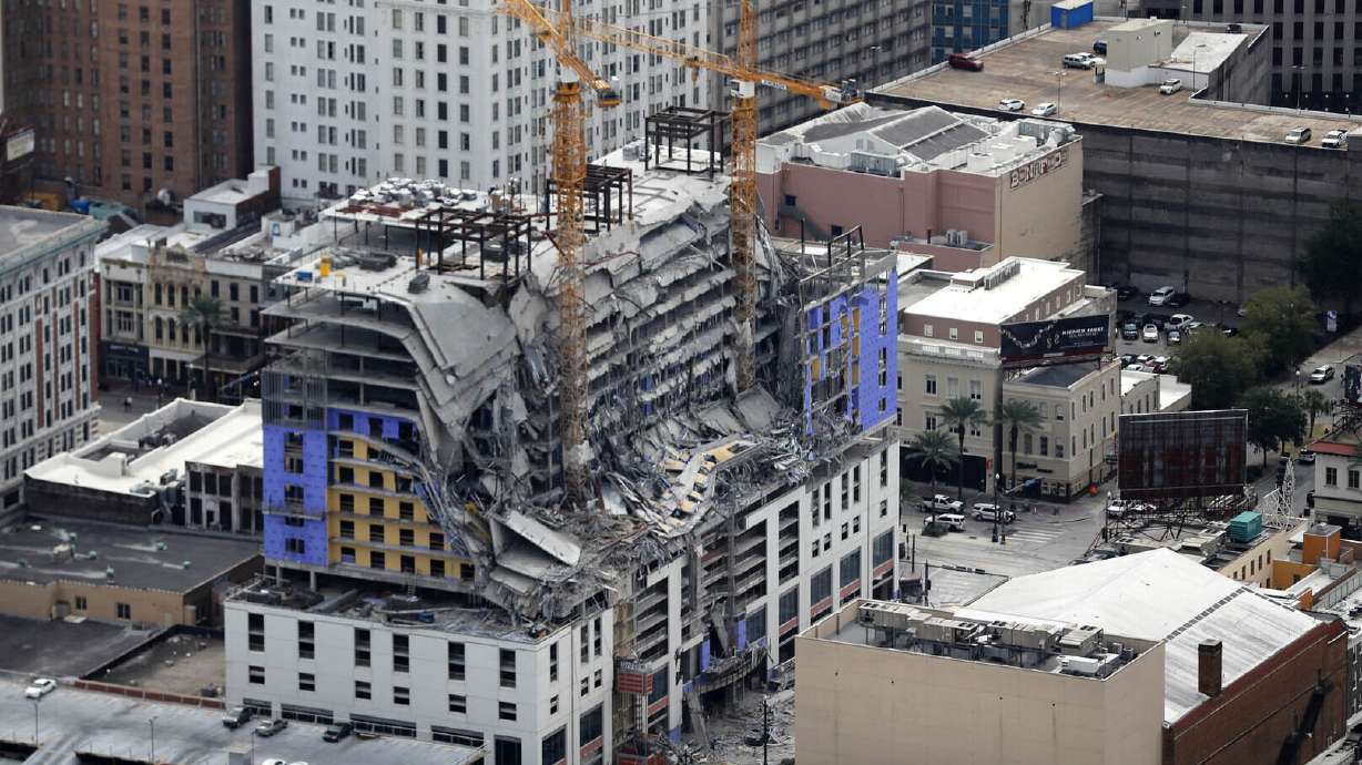 New tarp covers exposed remains at New Orleans collapse site