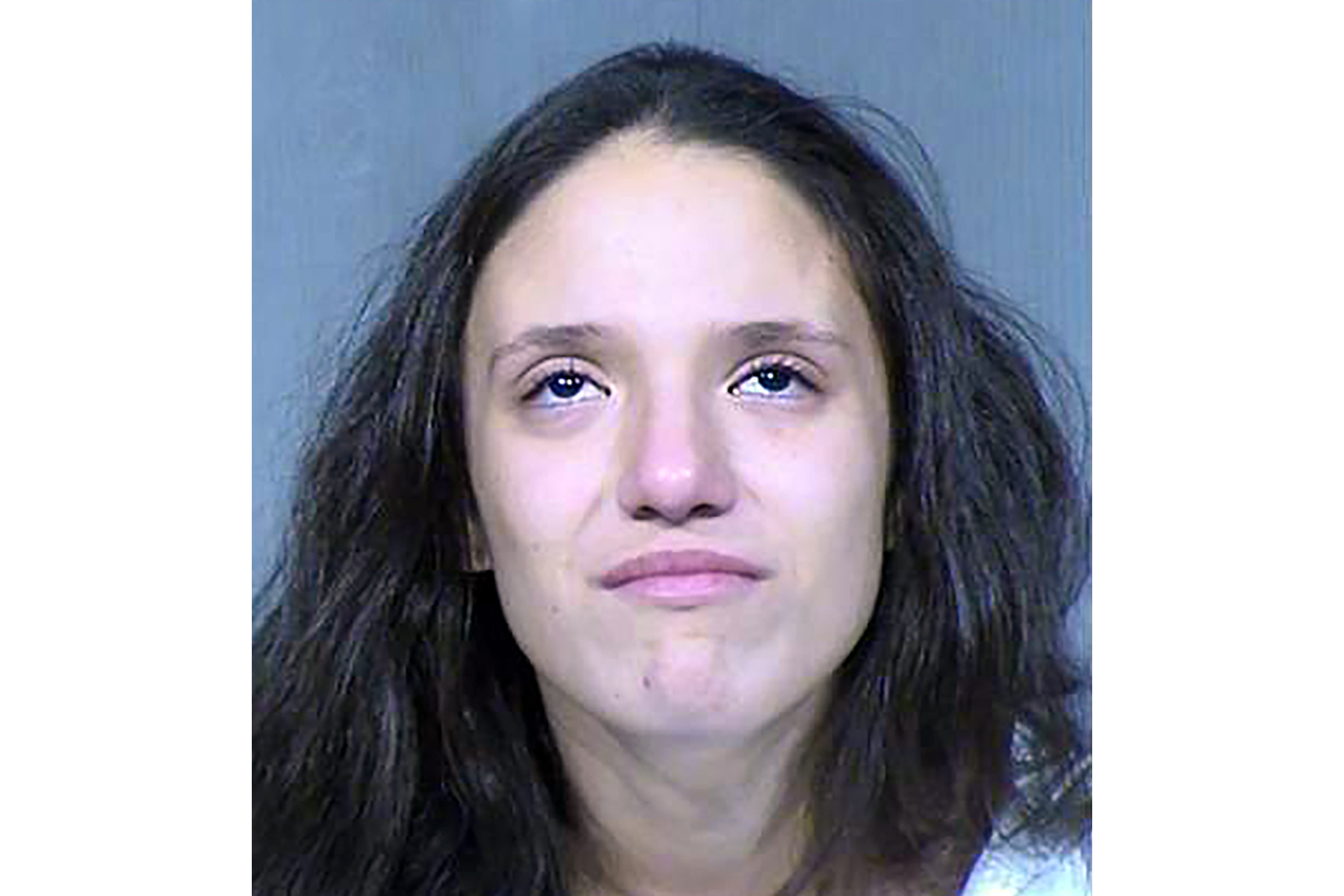 Children's aunt says she was home when they were suffocated 