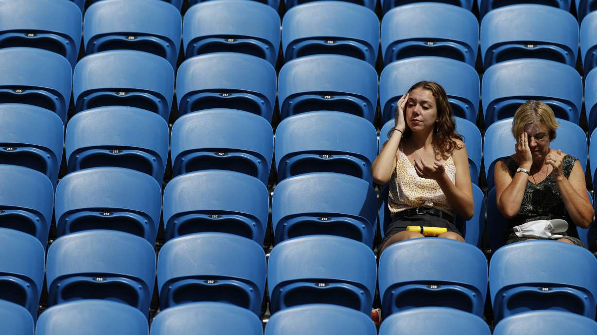 The Latest: Federer posts 100th match win at Australian Open