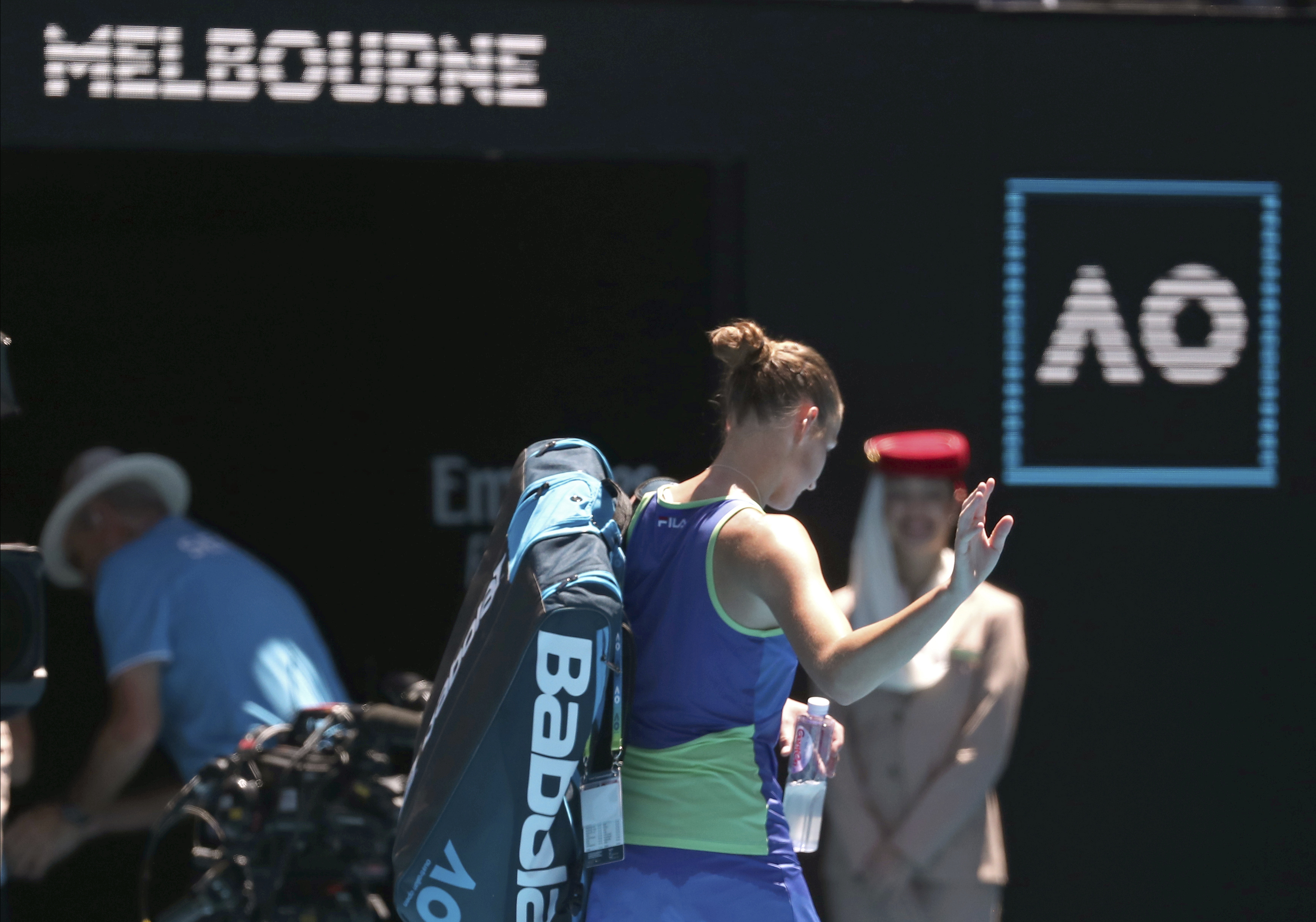 Bloodied but unbowed, Kyrgios sets Nadal clash in Australia