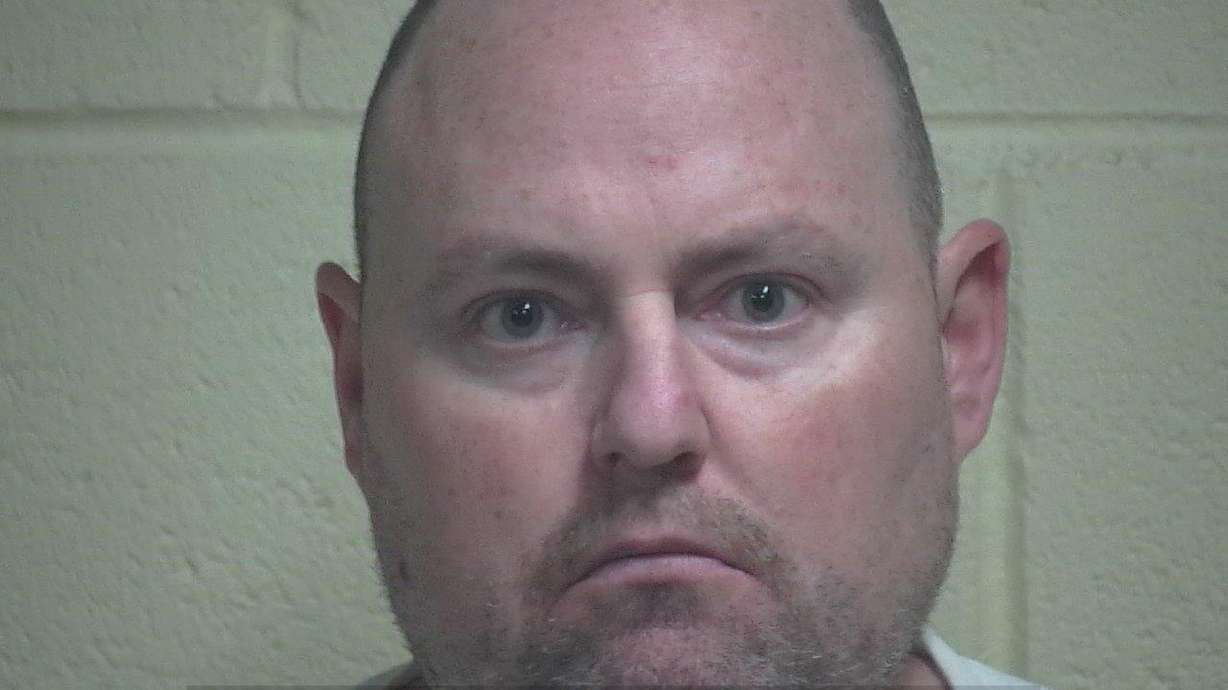Charges: Man threatened to shoot police, polygamists
