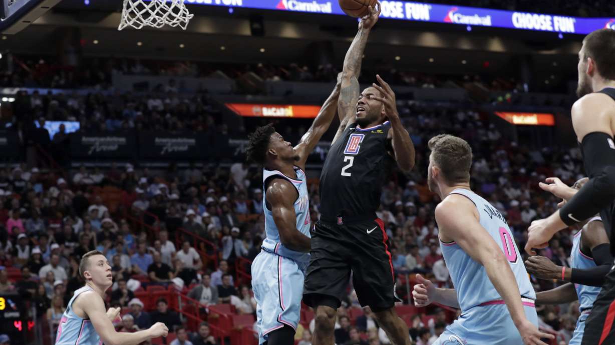 Leonard's 1st triple-double sends Clippers past Heat 122-117