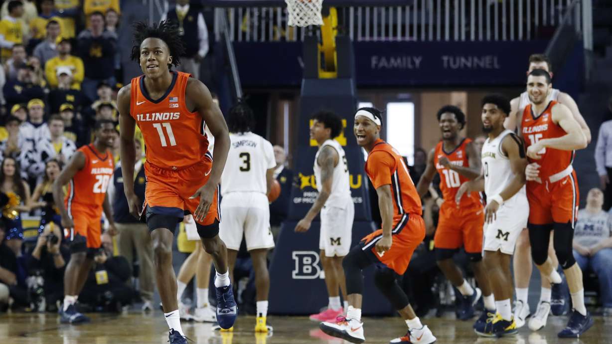 Dosunmu's shot lifts No. 21 Illinois over Michigan 64-62