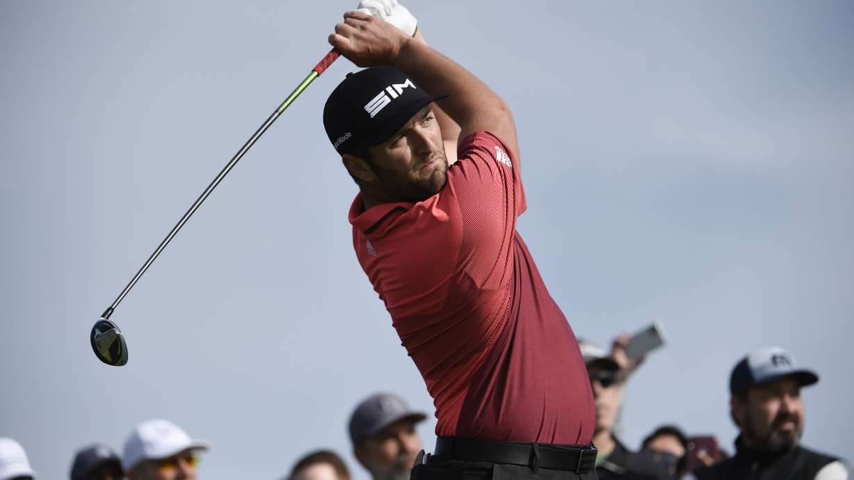 Rahm takes the lead at Torrey Pines with McIlroy lurking