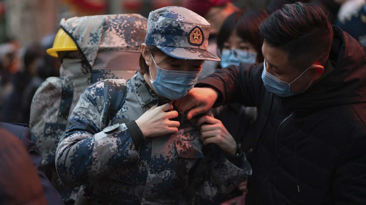 Virus death toll in China rises as US prepares evacuation