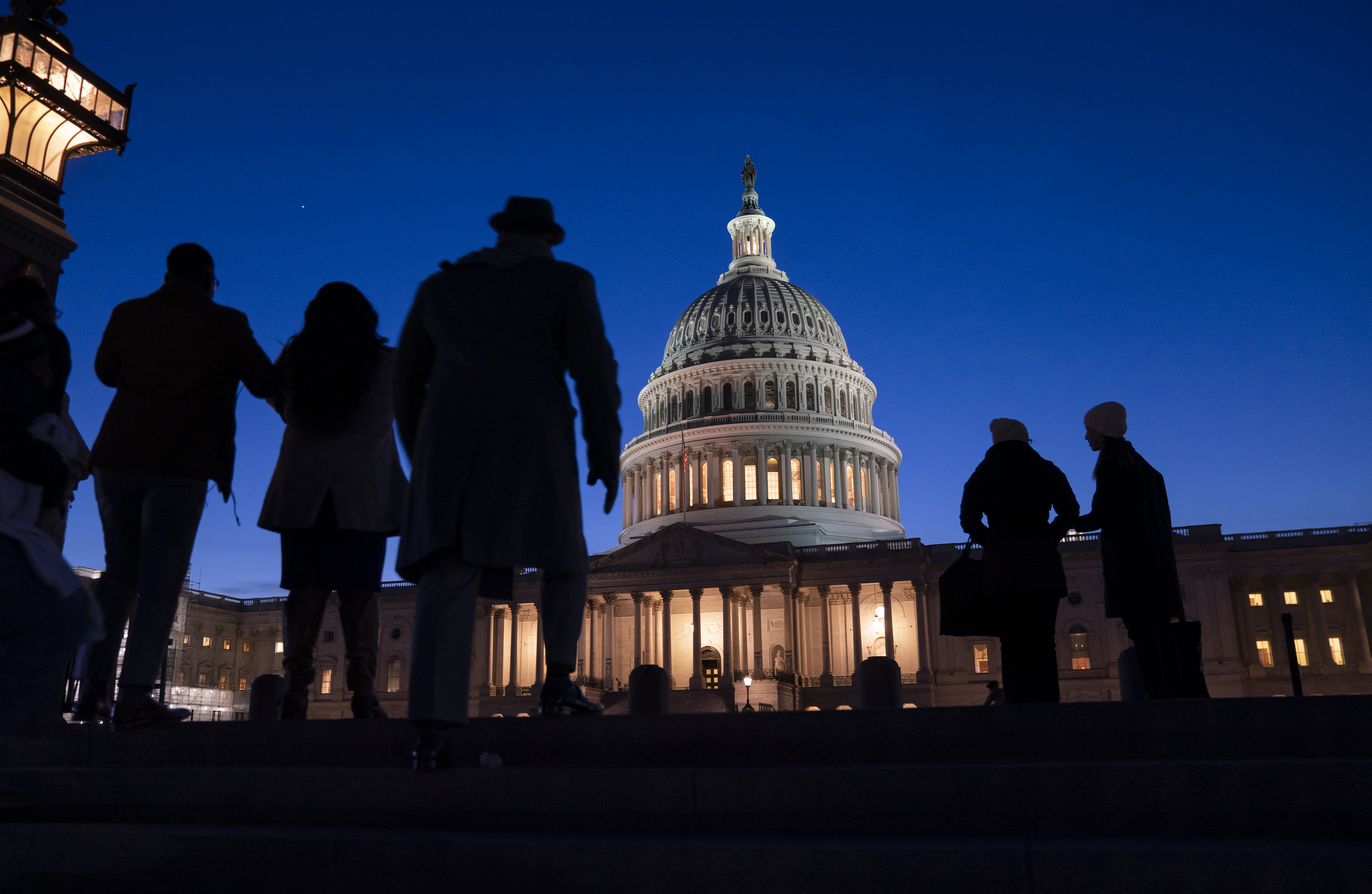 In divided America, some voters tuning out impeachment trial
