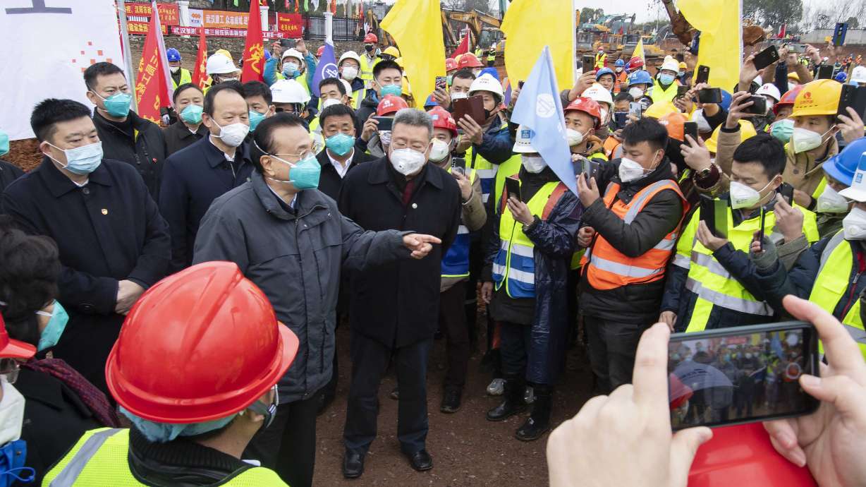 The Latest: US advises travelers to avoid all of China