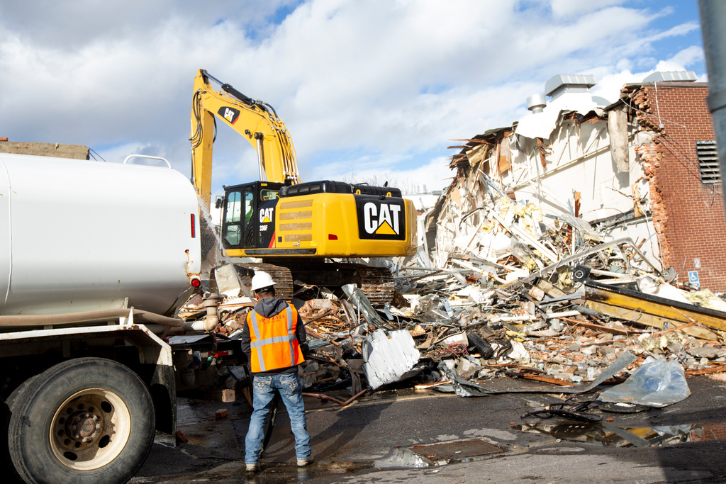 Demolition crews tear down the downtown Road Home shelter in Salt Lake City on Jan. 27, 2020. 