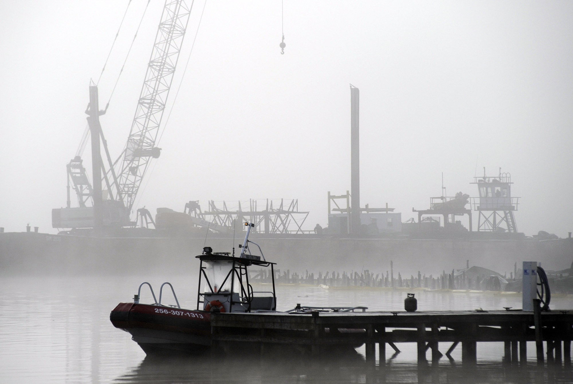 Coroner: 4 of 8 boat dock fire victims were children