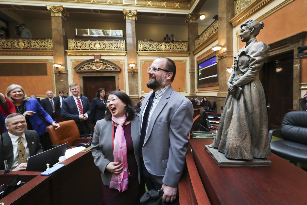 House Minority Caucus Manager Karen Kwan, D-Murray, laughs with artist Ben Hammond and his bronze statue depicting former state Sen. Martha Hughes Cannon on the House floor at the Capitol in Salt Lake City on Tuesday, Jan. 28, 2020. The statue is a 25-inch replica of the 7-foot-6-inch statue that will represent Utah at the U.S. Capitol’s National Statuary Hall. (Photo: Jeffrey D. Allred, KSL)